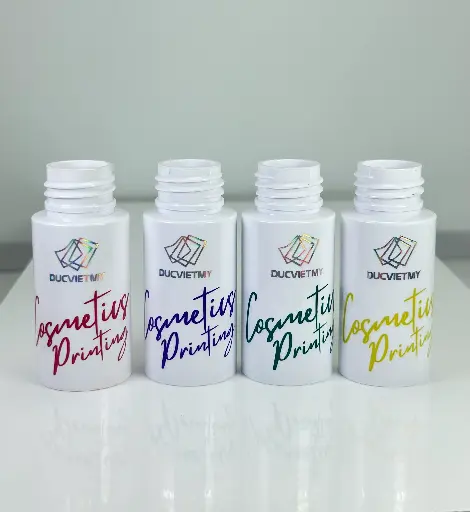 Chai PET Trắng 50ml Ép Kim Và in 1 Màu Bằng Mực UV