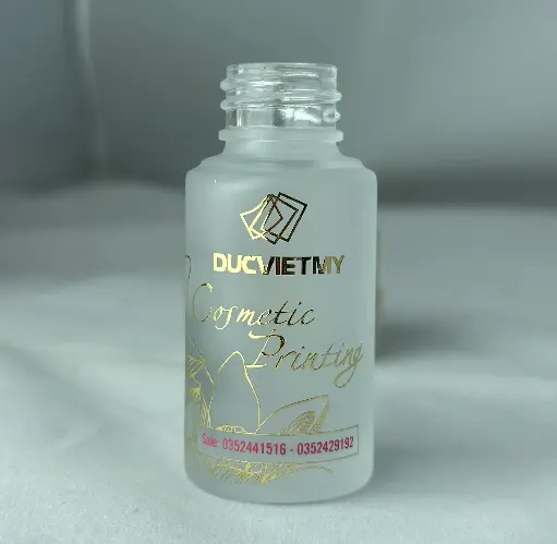 Chai Thuỷ Tinh Ép Kim Và In 1 Màu Bằng Mực UV